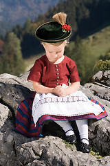 Image showing Little girls in Bavarian pray