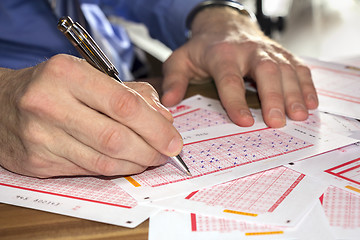 Image showing Man play lottery