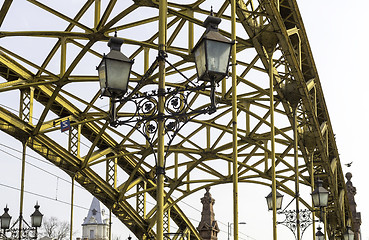 Image showing Decorative lamps hanging from bridge