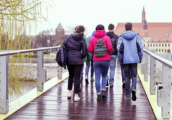 Image showing Group of friends on bridge