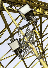 Image showing Decorative lamps hanging from bridge