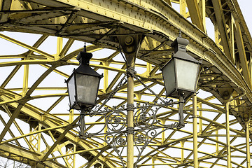 Image showing Decorative lamps hanging from bridge