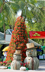 Image showing Flower tree and snowman