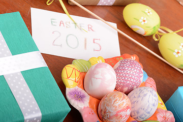 Image showing Easter setting with gift box and spring decoration