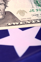 Image showing american dollars on american flag