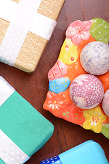 Image showing Easter setting with gift box and spring decoration