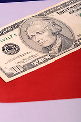 Image showing american dollars on american flag