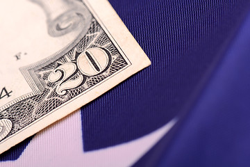 Image showing american dollars on american flag