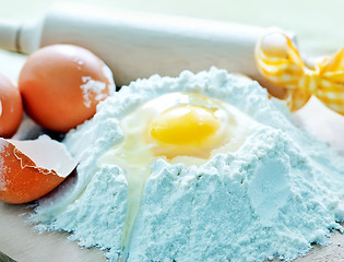 Image showing flour and raw eggs