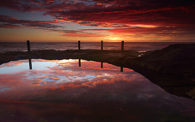 Image showing Spectacular sunrise over Ivo Rowe Rockpool Coogee Australia