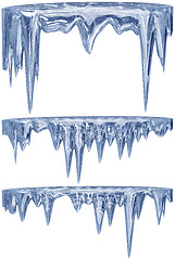 Image showing set of hanging thawing icicles of a blue shade