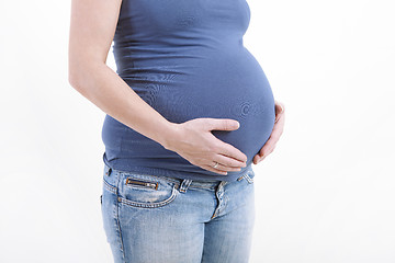 Image showing Pregnant with hands on belly