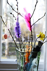 Image showing Easter still life, willow branch and feathers in a vase