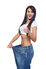 Image showing Young woman delighted with her dieting results