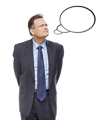 Image showing Businessman Looking Up At Blank Thought Bubble on White