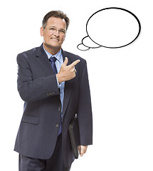 Image showing Businessman Pointing to the Blank Thought Bubble on White