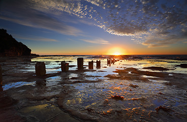 Image showing Sunrise, Reflections and silhouettes Coledale rockshelf