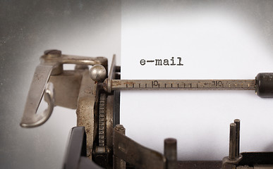 Image showing Old typewriter with paper