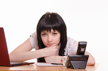 Image showing Tortured call-center employee at the desk