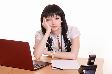 Image showing Thoughtful, tired call-center employee in the office