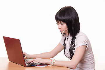 Image showing Call-center employee at the desk