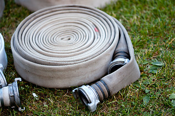 Image showing rolled fire hose