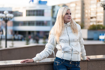 Image showing Blond woman over urban background