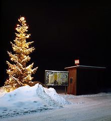 Image showing Christmas tree in snowy surroundings.