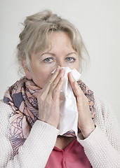 Image showing cold elderly woman