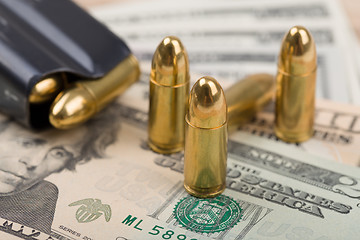 Image showing bullet on US dollar banknotes