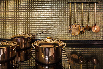 Image showing golden luxury kitchen cookware