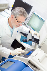 Image showing Life scientist researching in the laboratory.