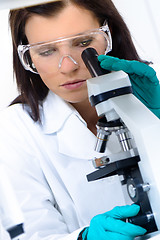 Image showing Young chemist in the laboratory.