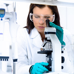 Image showing Young chemist in the laboratory.