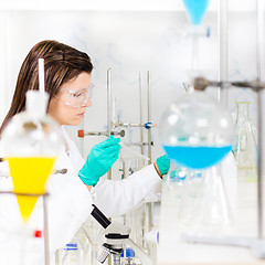 Image showing Young chemist in the laboratory.