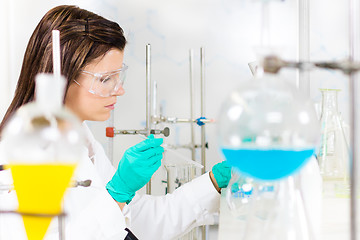 Image showing Young chemist in the laboratory.