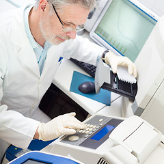 Image showing Life scientist researching in the laboratory.