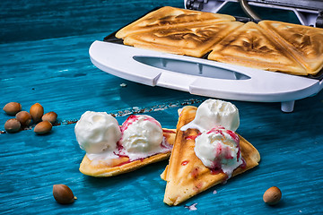 Image showing baked toast smeared ice cream in raspberry jam 