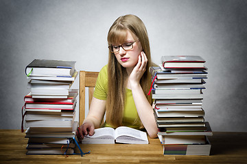 Image showing young woman is reading book