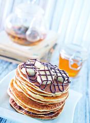 Image showing pancakes with banana and chocolate