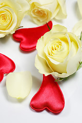 Image showing Red hearts and yellow roses