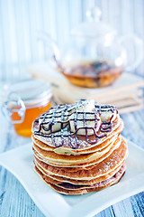 Image showing pancakes with banana and chocolate