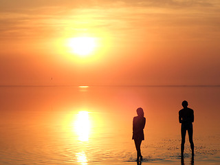 Image showing A black silhouette of a children on a sunset 2