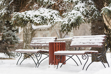 Image showing Winter landscape with two benches