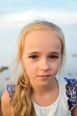 Image showing Portrait of little cute girl on sunset