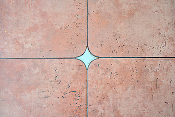 Image showing Decorated background tiles terracotta color