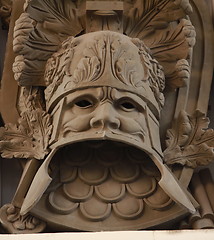 Image showing military heraldic mask bas relief