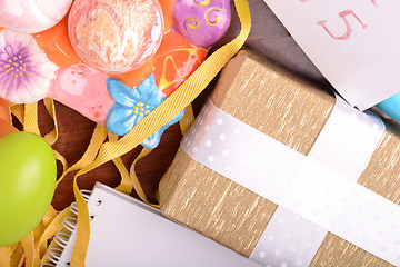 Image showing Easter setting with gift box and spring decoration