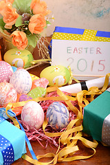 Image showing Easter setting with gift box and spring decoration