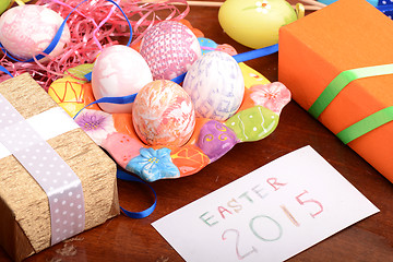 Image showing Easter setting with gift box and spring decoration